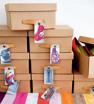 cardboard shoe boxes with photo tag labels