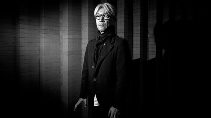 black and white portrait of composer Ryuichi Sakamoto