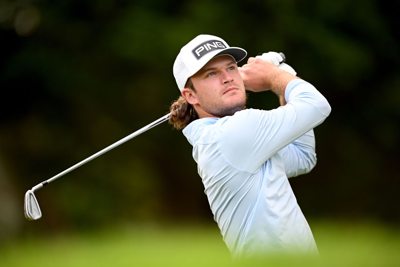 Freddy Schott hits an iron into the green
