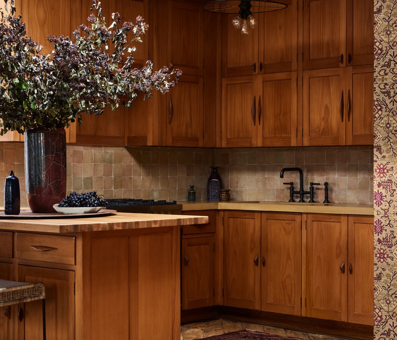 A small kitchen with counter overhang