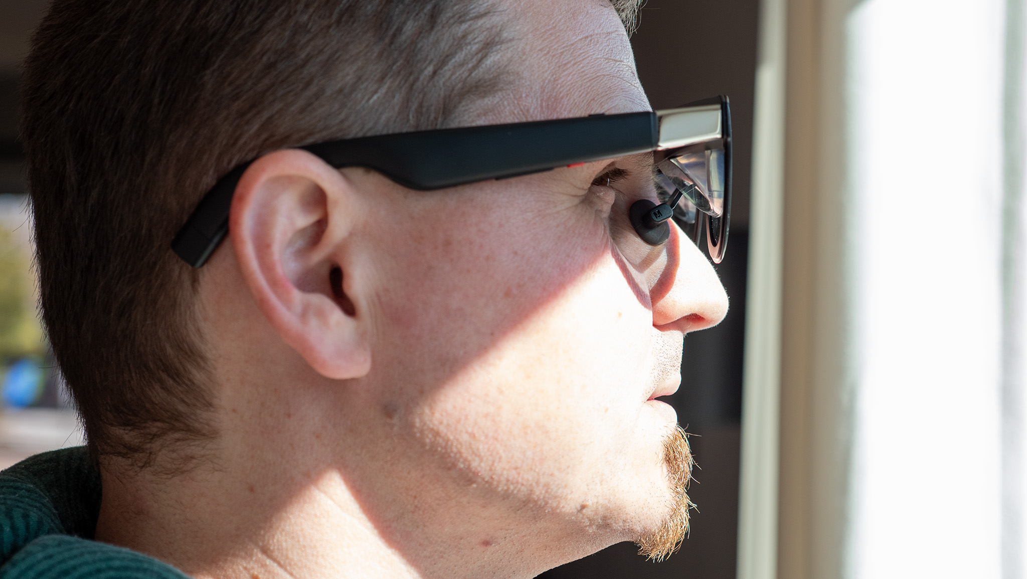 Wearing a pair of Xreal One smart glasses to show off the fit and size