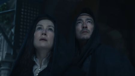 Rosamund Pike as Moiraine and Daniel Henney as Lan in The Wheel of Time season 3