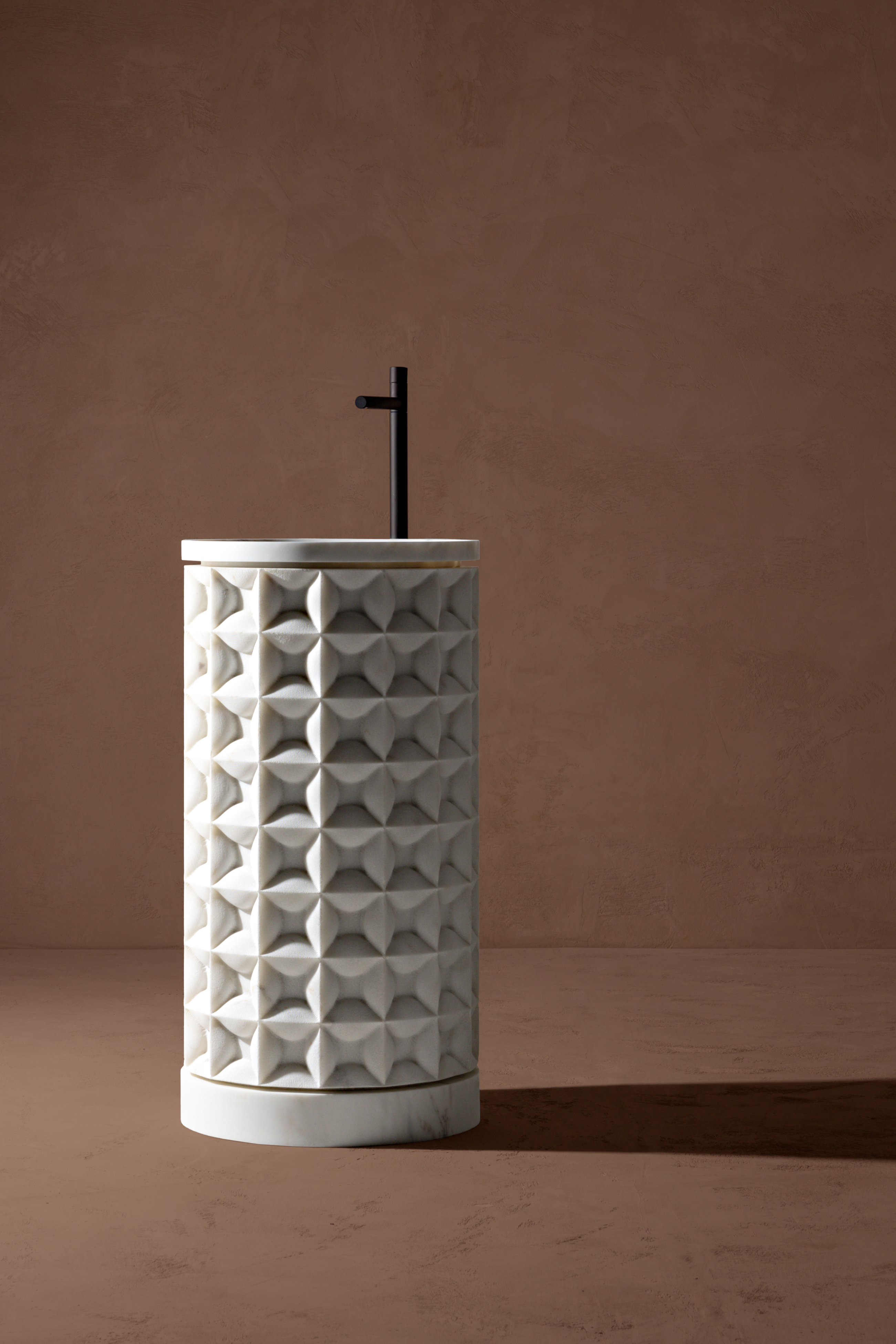 freestanding washbasin with textured surface
