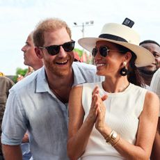 Prince Harry and Meghan Markle smile on tour in Columbia in 2024