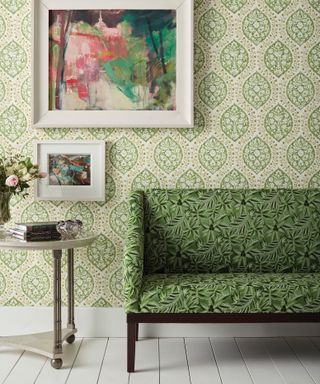 Nina Campbell's green home decor tips, living room with green wallpaper and white floor