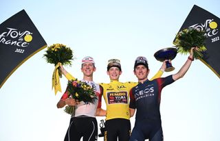 Tour de France 2022 final podium: l-r Tadej Pogačar (2nd), winner Jonas Vingegaard, Geraint Thomas (3rd)