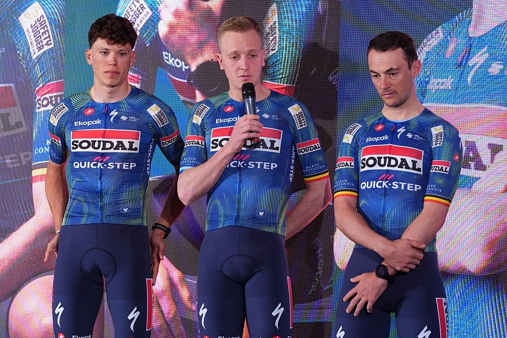 L-R, French Paul Magnier of Soudal Quick-Step, Belgian Tim Merlier of Soudal Quick-Step and Belgian Yves Lampaert of Soudal Quick-Step pictured during the team presentation of the Soudal Quick-Step cycling team in Calpe, Spain, Thursday 08 January 2026.BELGA PHOTO JOMA GARCIA (Photo by JOMA GARCIA / BELGA MAG / Belga via AFP)