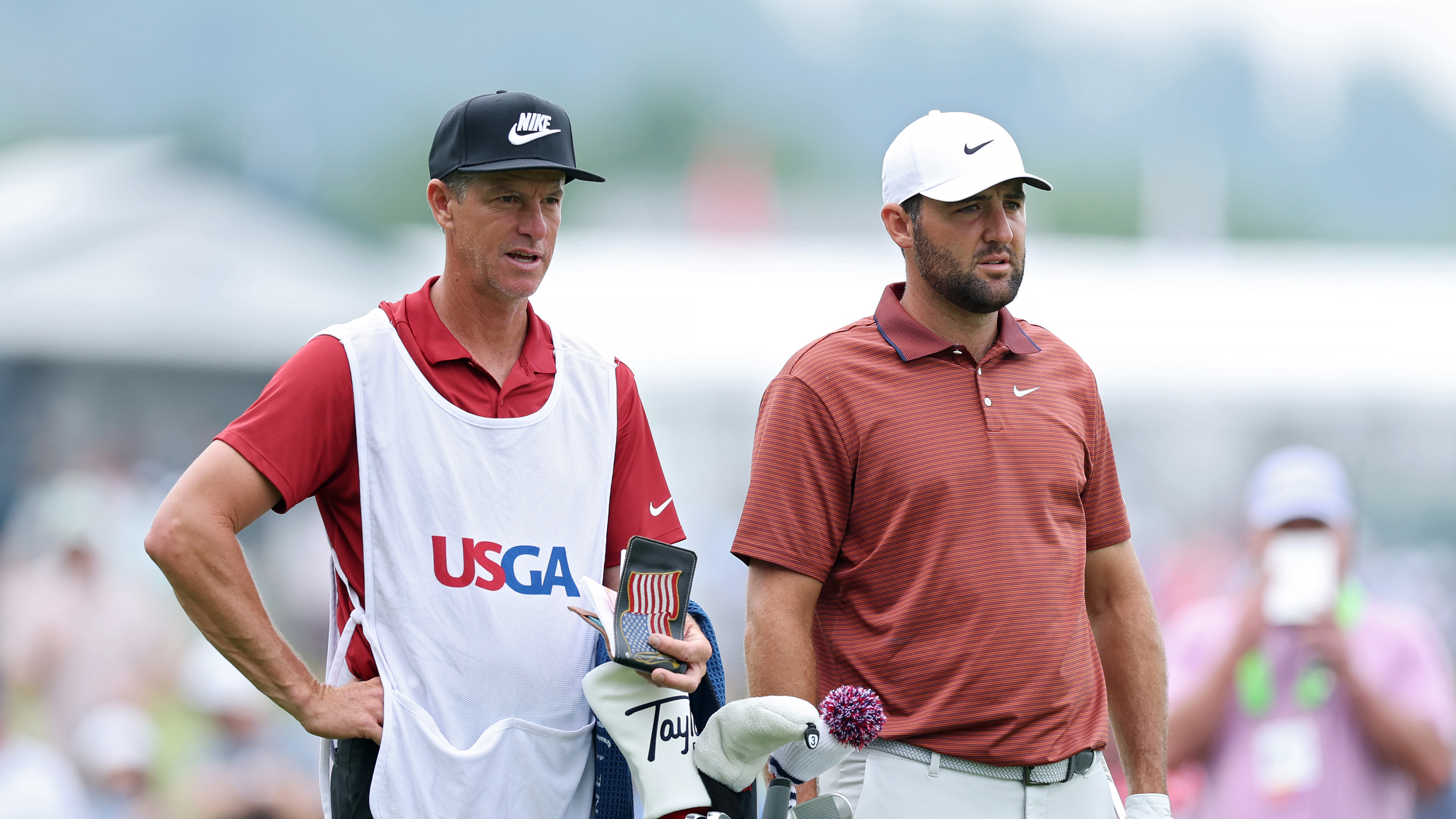 Ted Scott (left) and Scottie Scheffler look on during the 2025 US Open