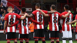 Sheffield United players in Maddy Cusack shirts ahead of their Premier League game against Newcastle in a tribute to the former Blades midfielder who passed away earlier in September.