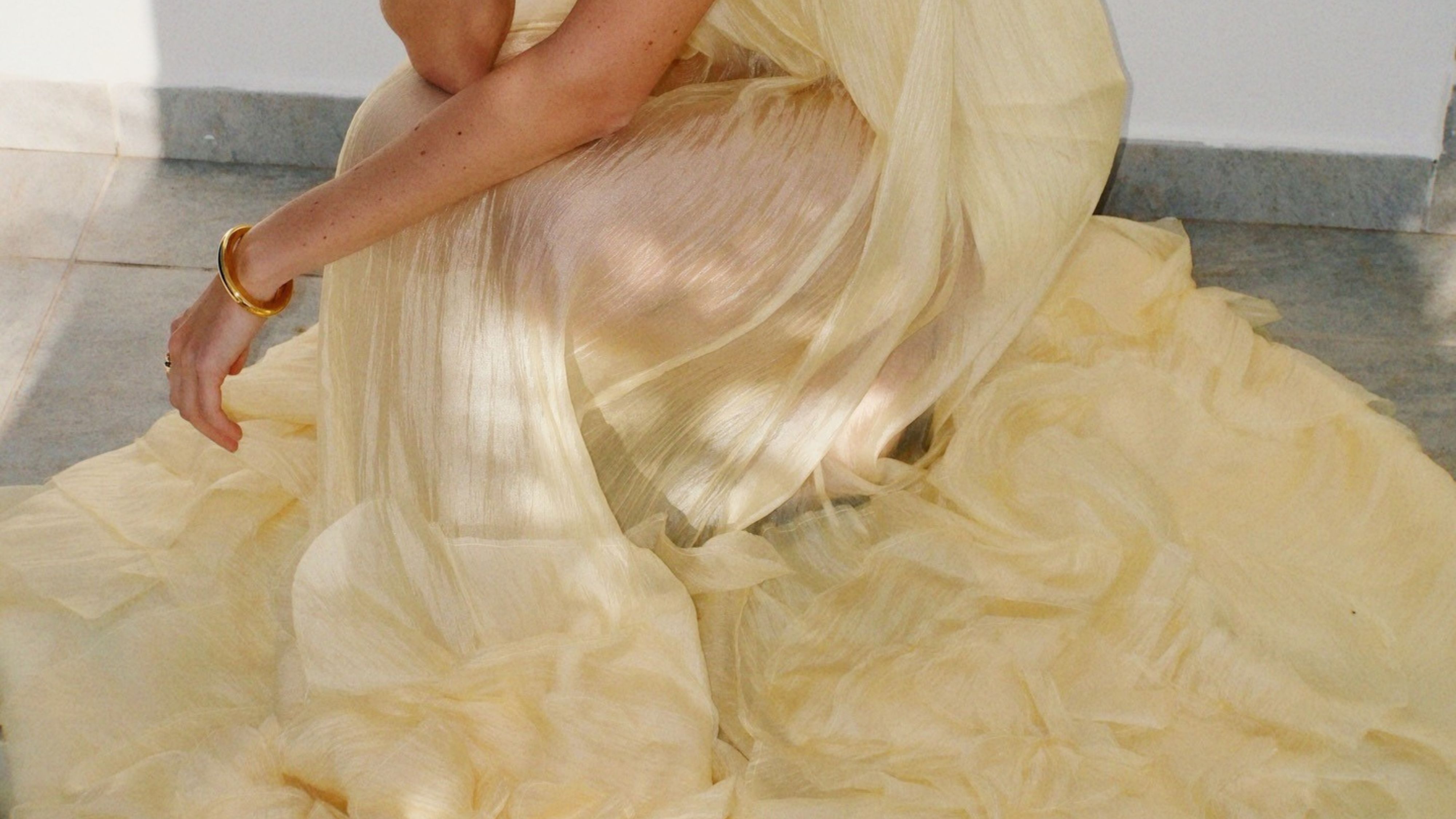 @juliesfi wearing one of the best boho dresses for summer 2026