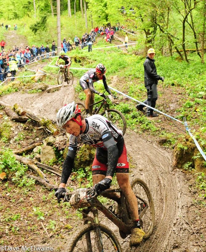 Maxime Marotte (BH-SR Suntour-KMC) descending some muddy switchbacks