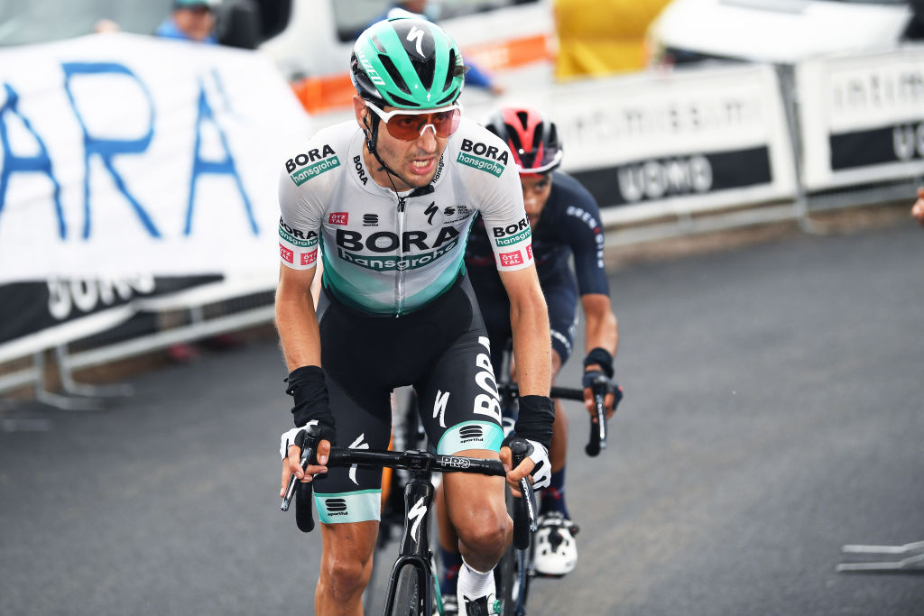 MONTE ZONCOLAN ITALY MAY 22 Emanuel Buchmann of Germany and Team Bora Hansgrohe during the 104th Giro dItalia 2021 Stage 14 a 205km stage from Cittadella to Monte Zoncolan 1730m UCIworldtour girodiitalia Giro on May 22 2021 in Monte Zoncolan Italy Photo by Tim de WaeleGetty Images