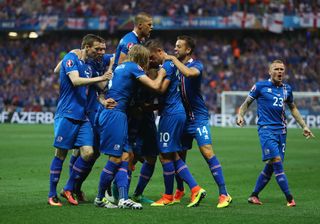 Iceland players celebrate a goal against England at Euro 2016.