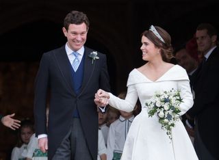 Jack Brooksbank and his bride Princess Eugenie outside St George's Chapel on their wedding day in 2018.