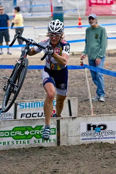 Susan Butler (Hudz - Subaru) flies over the barriers.