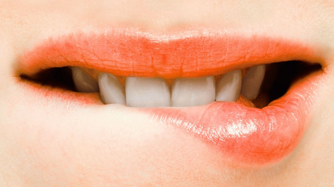 Lip, Skin, Eyelash, Tooth, Orange, Organ, Tints shades, Photography, Close-up, Material property, 