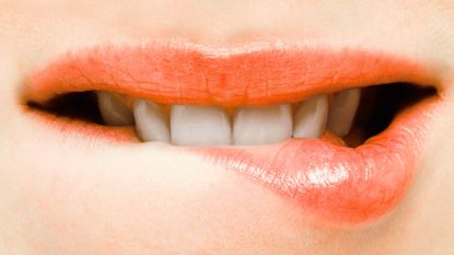 Lip, Skin, Eyelash, Tooth, Orange, Organ, Tints shades, Photography, Close-up, Material property, 