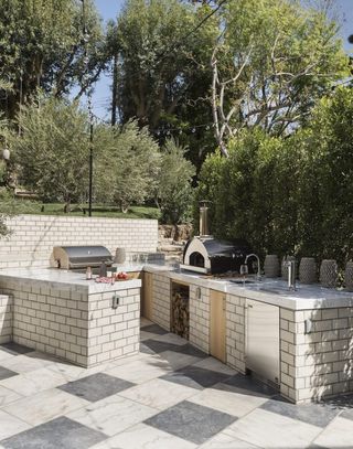 patio idea with a stylish outdoor kitchen