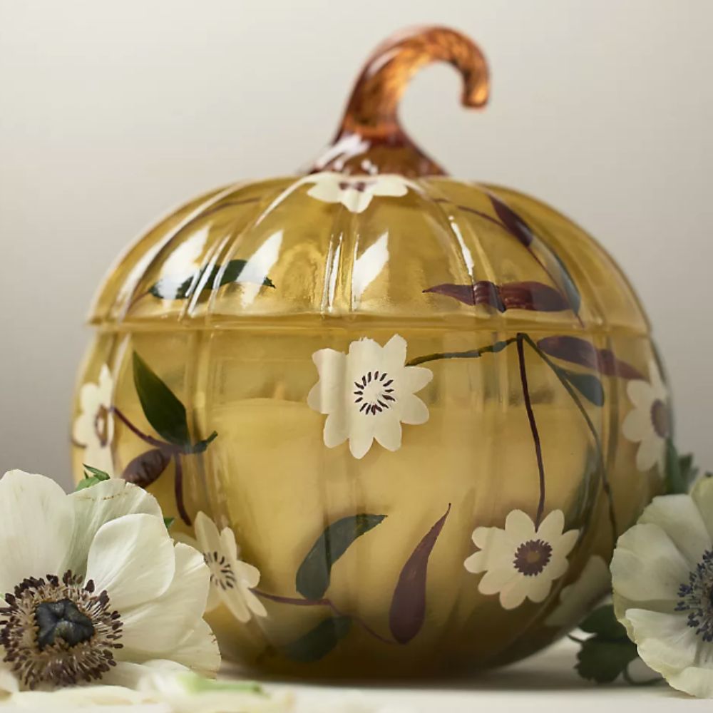 Colored glass pumpkin candle