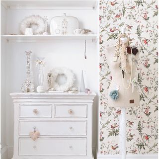 dressing room with floral wallpaper and table