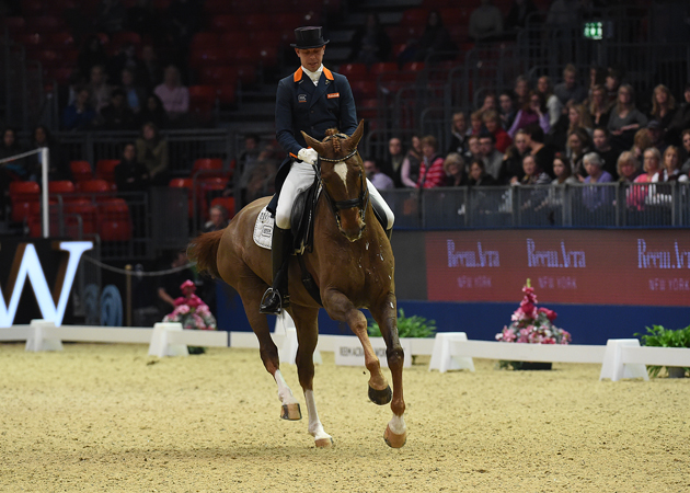 Hans Peter Minderhoud riding 10 Glocks Flirt during the Reem Acra FEI World Cup Dressage Grand Prix at The London International Horse Show 2015 at Olympia, London , UK on 15th December 2015