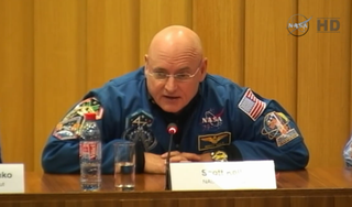 NASA astronaut Scott Kelly speaks to reporters during a news conference on Dec. 18, 2014, before his 2015 launch to the International Space Station for a one-year mission.