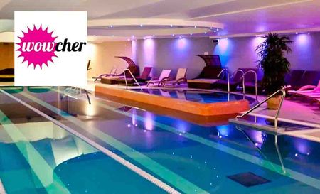 Wowcher Logo placed over an image of a spa
