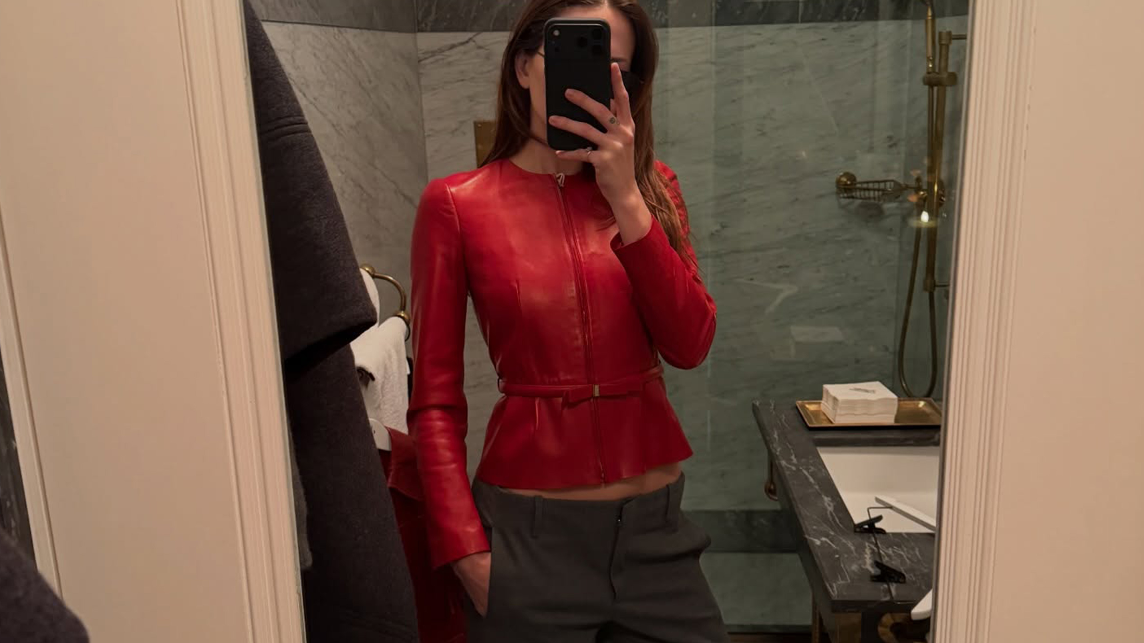 eliza huber wearing red fitted leather jacket
