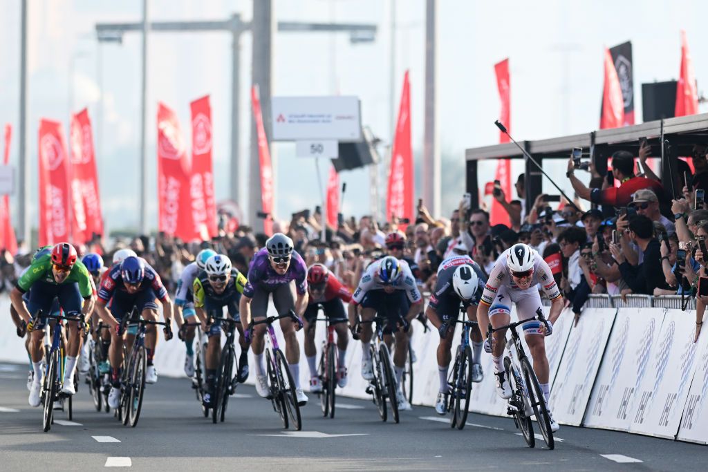 ABU DHABI UNITED ARAB EMIRATES FEBRUARY 22 LR Jonathan Milan of Italy and Team LidlTrek Green points jersey Maximilian Richard Walscheid of Germany and Team Jayco AlUla Jasper Philipsen of Belgium and Team AlpecinDeceuninck and Tim Merlier of Belgium and Team Soudal QuickStep sprint at finish line to win the stage during the 7th UAE Tour 2025 Stage 6 a 165km stage from Abu Dhabi Cycling Club to Abu Dhabi Breakwater UCIWWT on February 22 2025 in Abu Dhabi United Arab Emirates Photo by Dario BelingheriGetty Images