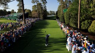 Scottie Scheffler plays his shot from the 18th tee during the final round of the Masters at Augusta National Golf Club on April 10, 2022 in Augusta, Georgia.