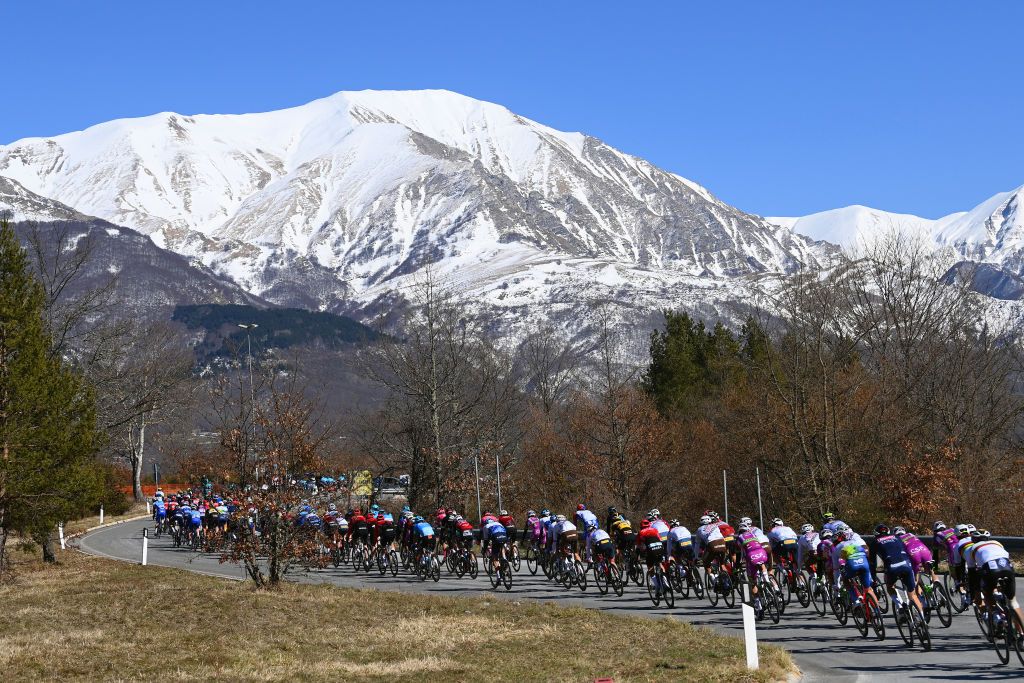BELLANTE ITALY MARCH 10 A general view of the peloton passing through a snowy mountain landscape during the 57th TirrenoAdriatico 2022 Stage 4 a 202km stage from Cascata delle Marmore to Bellante 345m TirrenoAdriatico WorldTour on March 10 2022 in Bellante Italy Photo by Tim de WaeleGetty Images