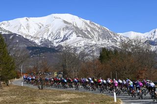 BELLANTE ITALY MARCH 10 A general view of the peloton passing through a snowy mountain landscape during the 57th TirrenoAdriatico 2022 Stage 4 a 202km stage from Cascata delle Marmore to Bellante 345m TirrenoAdriatico WorldTour on March 10 2022 in Bellante Italy Photo by Tim de WaeleGetty Images