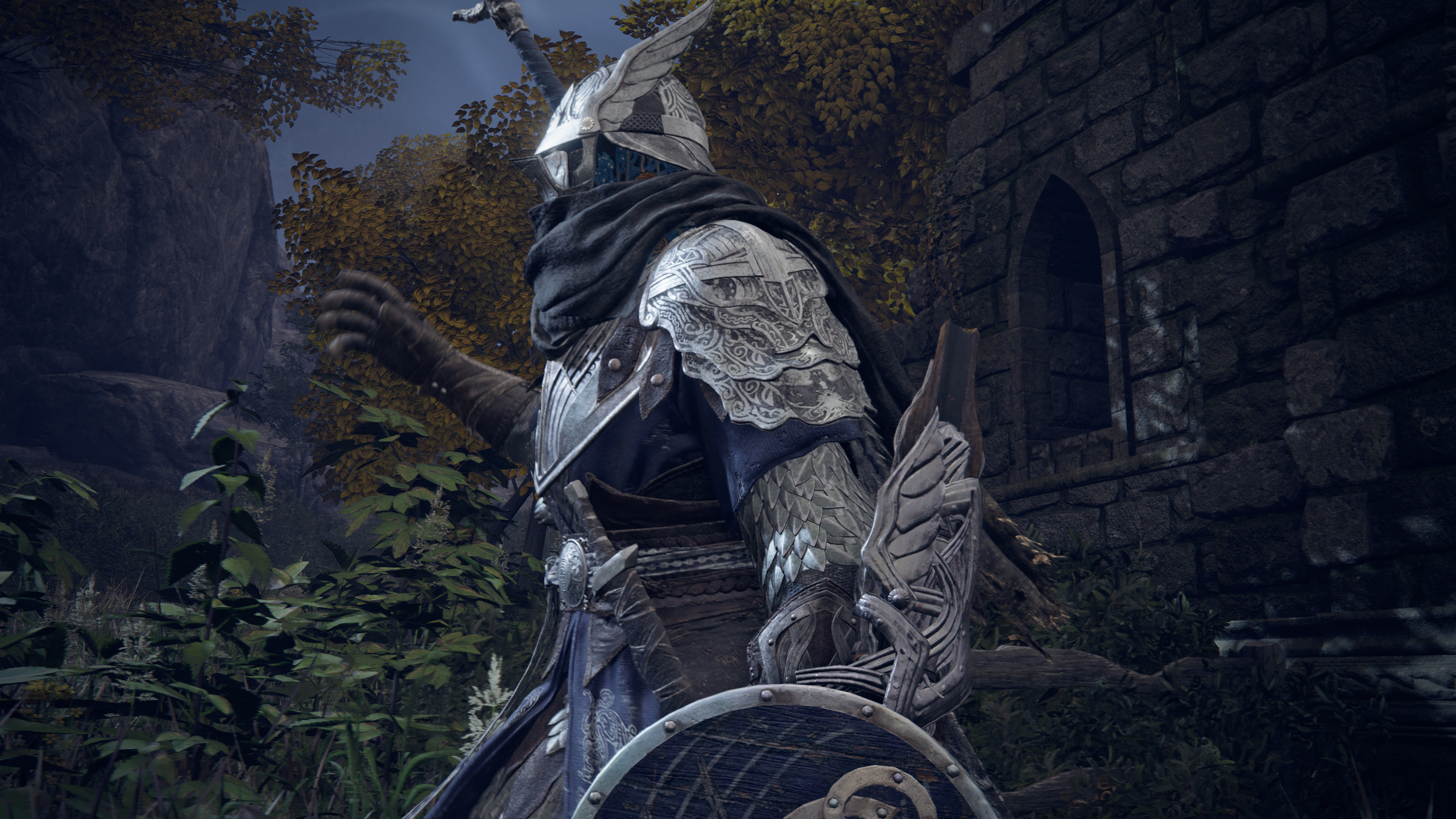 Elden Ring Nightreign Remembrance quests: Wylder reaching to grab his sword off his back as he leaves a ruin.
