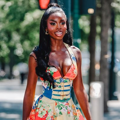 Olandria smiling at the camera