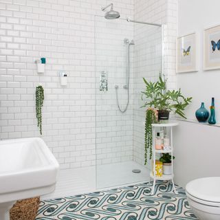 modern bathroom with shower area and bath tub