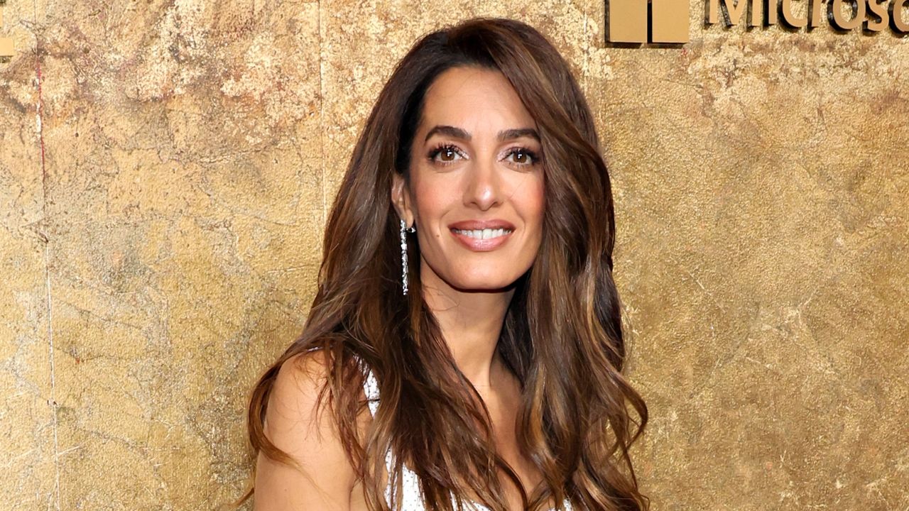 Amal Clooney&#039;s white sequin cami dress seen as she attends the Clooney Foundation For Justice&#039;s &quot;The Albies&quot;