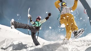 two skiers having fun in snow