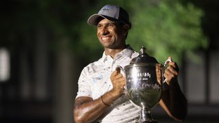 Aaron Rai with the Wyndham Championship trophy