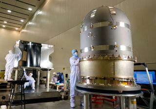 The MAVEN spacecraft's large hydrazine propellant tank is pictured prior to being installed in the core structure of the spacecraft at a Lockheed Martin clean room near Denver.