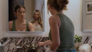 Scene where Sydney Sweeney is cleaning a bathroom in The Housemaid when Amanda Seyfried sneaks up to her.