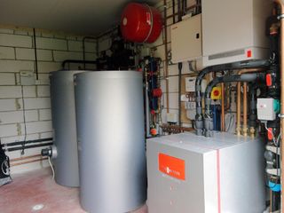 a plant room containing a heat pump unit