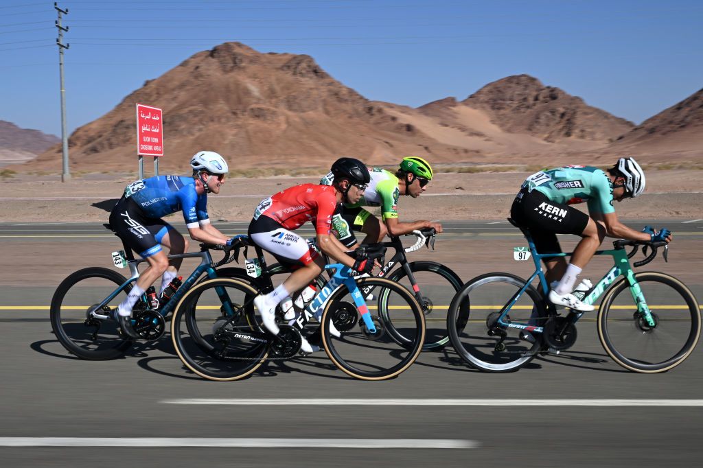 ALULA CAMEL CUP TRACK SAUDI ARABIA FEBRUARY 01 LR Mathias Bregnhoj of Denmark and Terengganu Cycling Team Nicolo Garibbo of Italy and JCL Team Ukyo Ceriel Desal of Belgium and Team Wagner Bazin WB and Diego Uriarte Belzunegi of Spain and Equipo Kern Pharma compete in the breakaway during the 5th AlUla Tour 2025 Stage 5 a 1696km stage from AlUla Camel Cup Track to AlUla Camel Cup Track on February 01 2025 in AlUla Saudi Arabia Photo by Szymon GruchalskiGetty Images