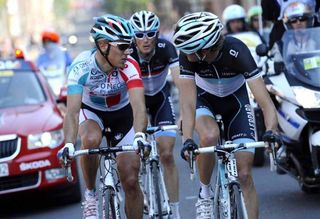 Andy Schleck (Leopard Trek) consults with Philippe Gilbert (Omega-Pharma Lotto) on the road to Ans.