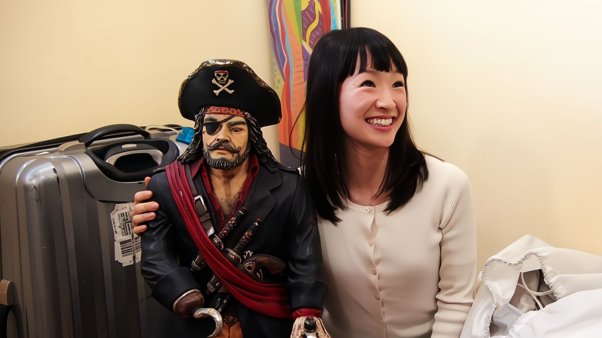 Marie Kondo with a pirate figurine in Tidying Up With Marie Kondo