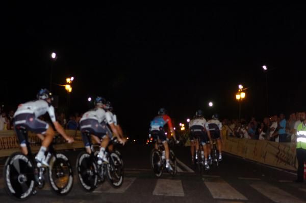 Saxo Bank riders accelerate out of a corner