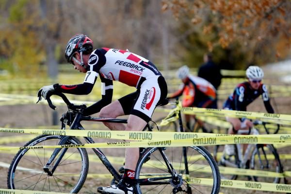 Riders navigate the spider web of tape that makes up the course.