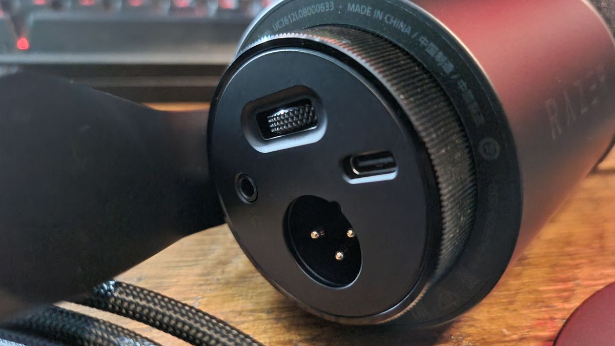 The underside of the Razer Seiren V3 Pro, showing the XLR and ISB Type-C ports