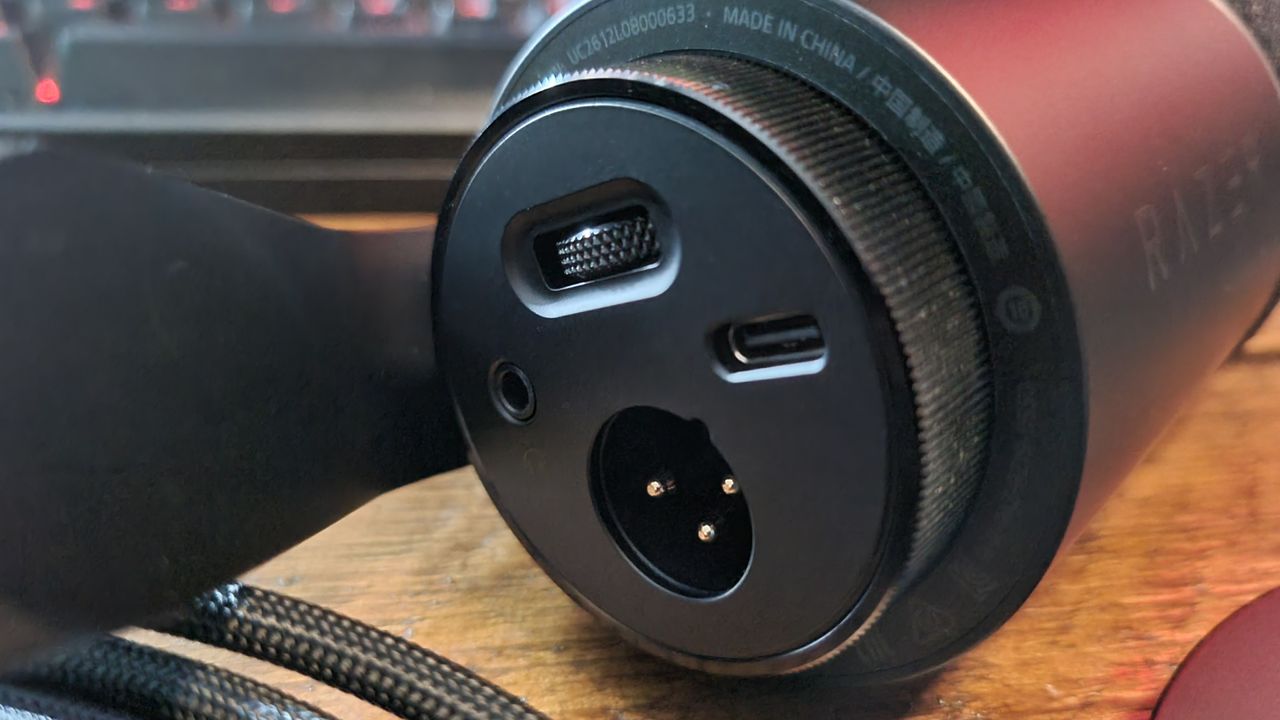 The underside of the Razer Seiren V3 Pro, showing the XLR and ISB Type-C ports