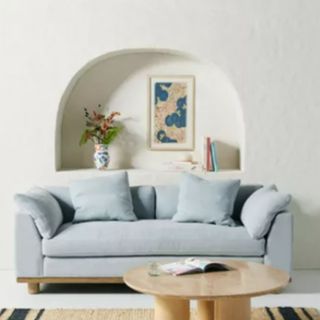 A light blue loveseat from Anthropologie