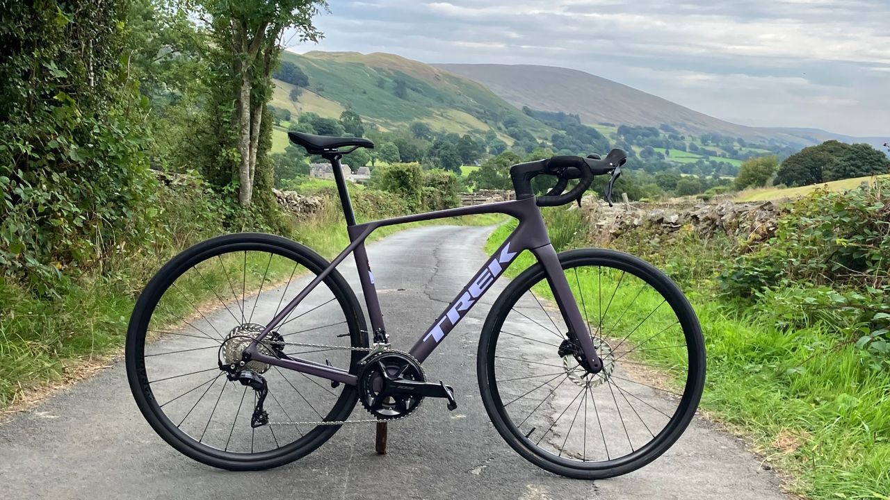 Trek Domane SL 5 Gen 5 with hills in the background